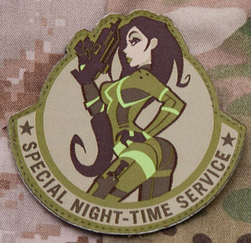 Some modern pinup action, to inspire those who take a more stealthy approach. This patch is done by the woven method to retain the original art detail